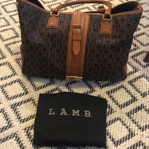 large tote bag from luxury handbag L.A.M.B. line.